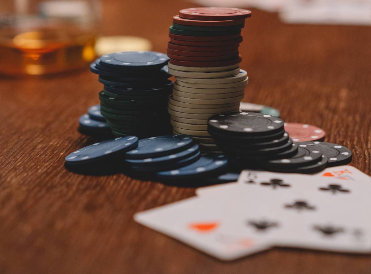 cards and gambling chips on table