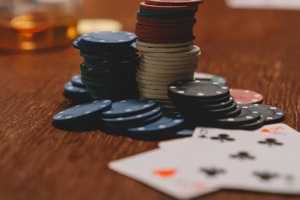 cards and gambling chips on table